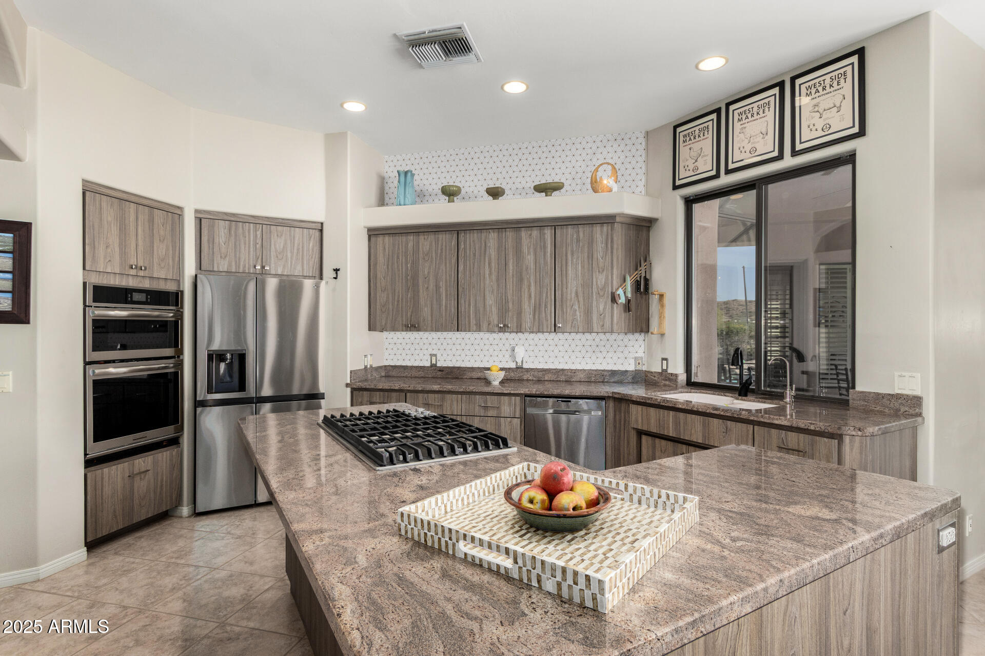 6645 East Redmont Drive, Unit 13 Mesa, AZ 85215 - Photo 8 of 41 a kitchen with a refrigerator and a stove