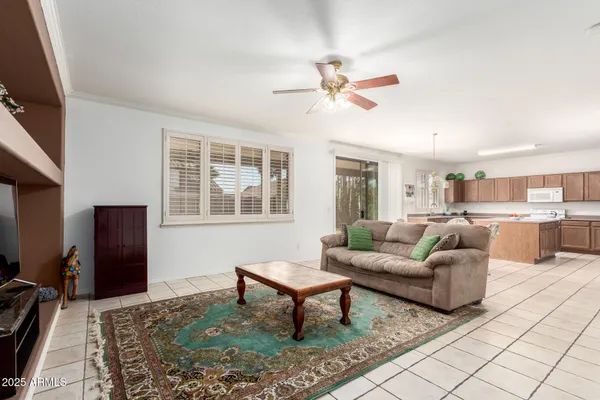 a living room with furniture and a window
