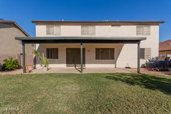 a view of a house with a patio
