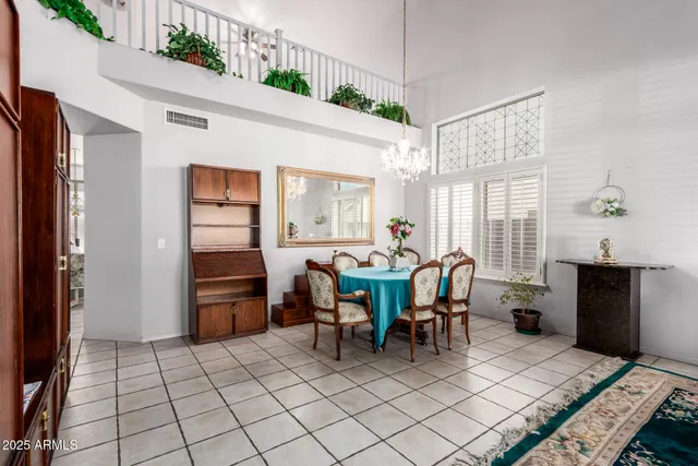 a dining room filled with furniture