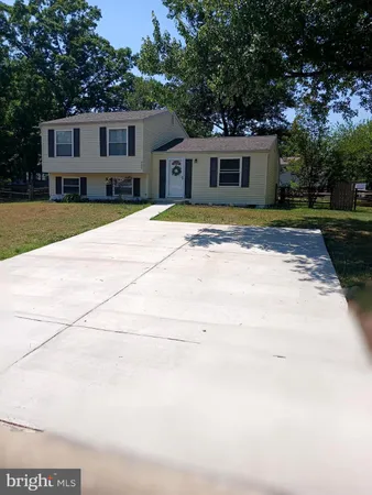 a house view with a outdoor space