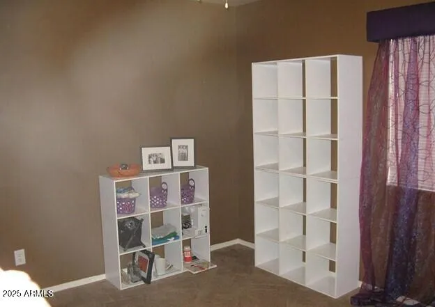 a view of a chairs and table on the wooden floor