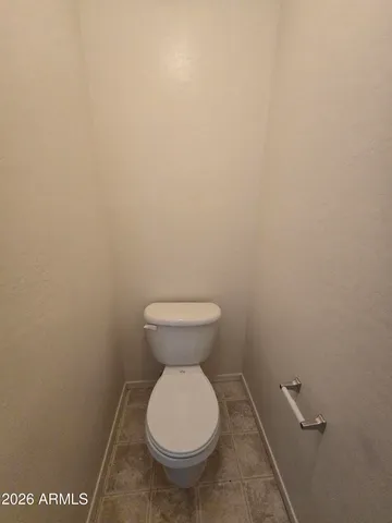 a bathroom with a toilet