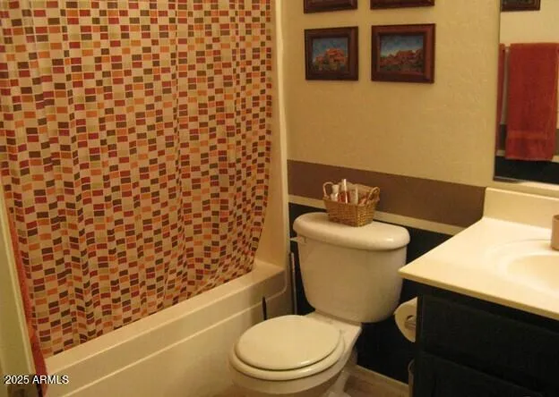 a bedroom with a bed and a lamp on table