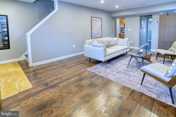 a living room with furniture and a couch