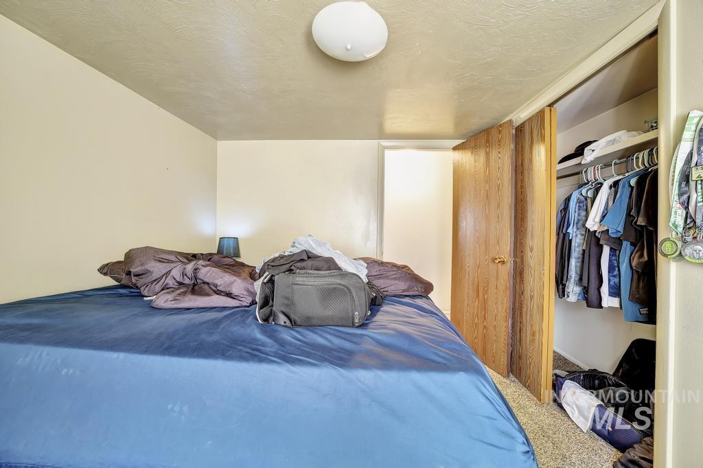 111 2nd Street Rupert, ID 83350 - Photo 29 of 45 Light-colored walls with a textured ceiling