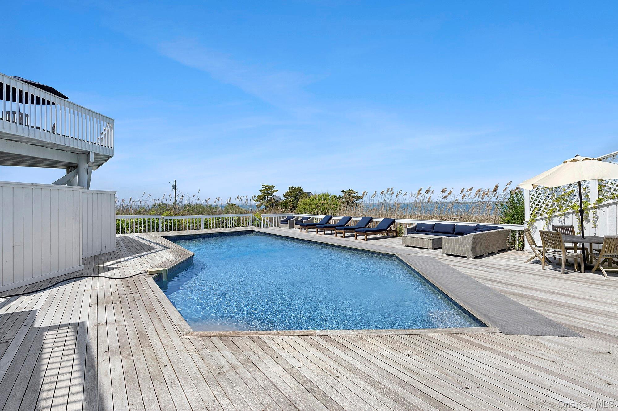 588 Dune Road Westhampton, NY 11978 - Photo 17 of 23 a view of a terrace with seating space