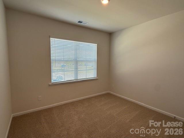 2315 Riggs Road Sherrills Ford, NC 28673 - Photo 4 of 17 an empty room with a window