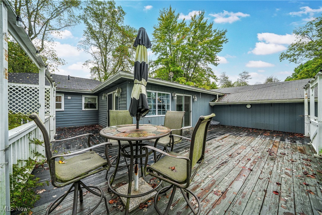2822 Selkirk Bush Road Warren, OH 44481 - Photo 37 of 50 Wooden terrace featuring outdoor dining area