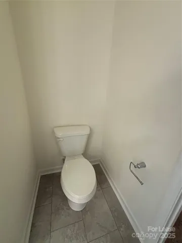 a bathroom with a toilet