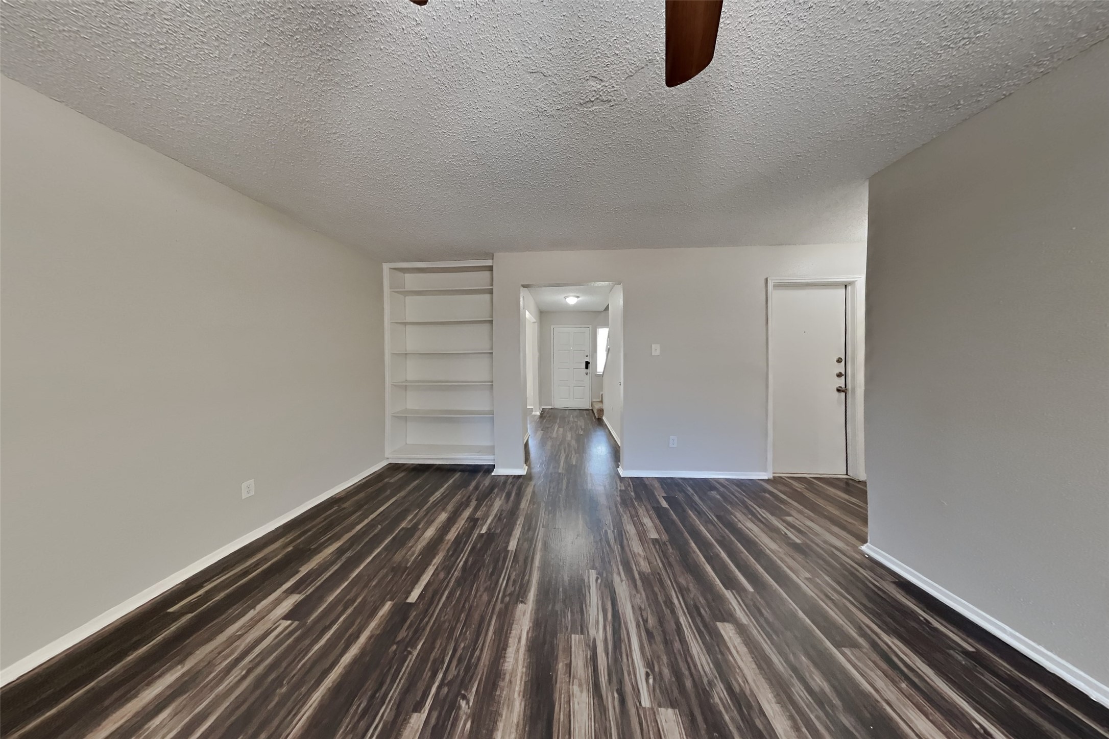 10018 Rippling Fields Drive Houston, TX 77064 - Photo 2 of 21 a view of wooden floor in an empty room