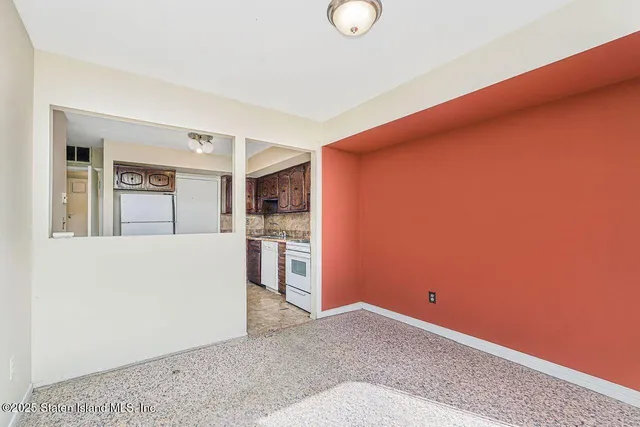 a view of livingroom with kitchen