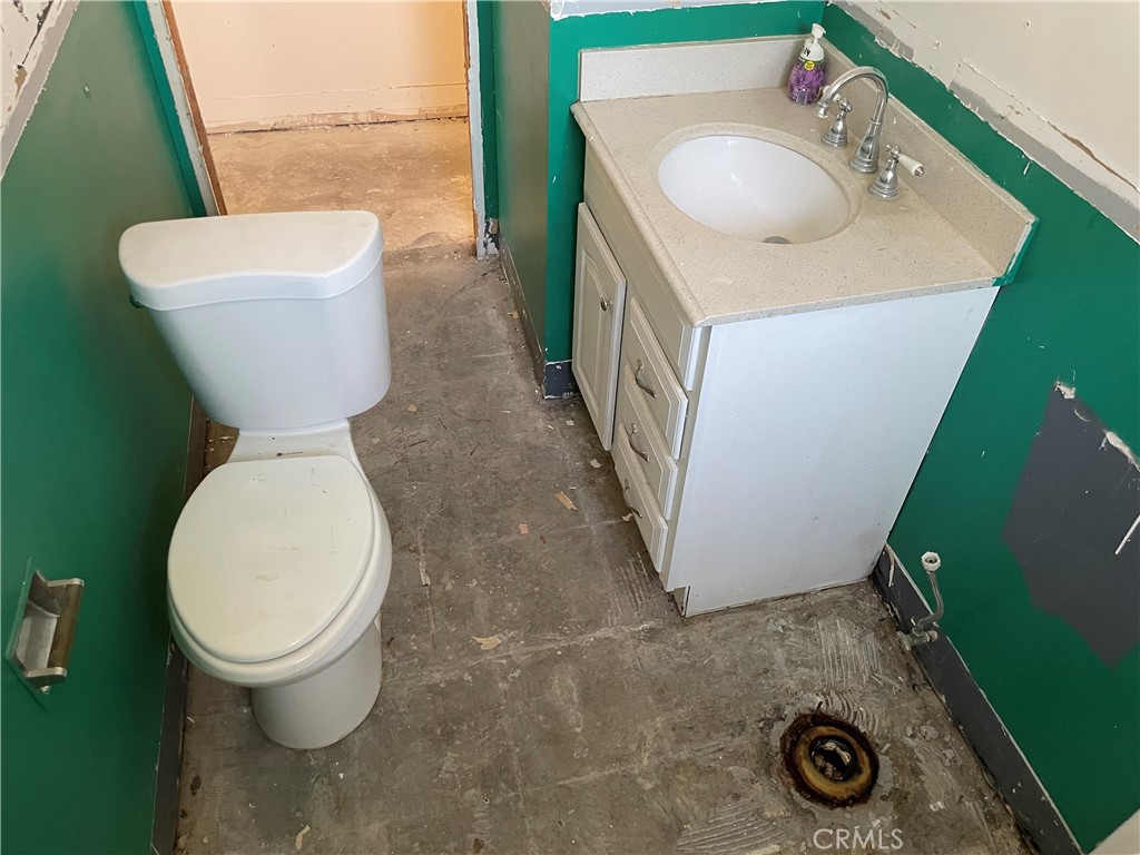 2441 Madrone Street Sutter, CA 95982 - Photo 16 of 45 a bathroom with a sink toilet and mirror