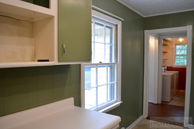 542 Deck Hill Road Boone, NC 28607 - Photo 8 of 39 a view of an empty room with glass door