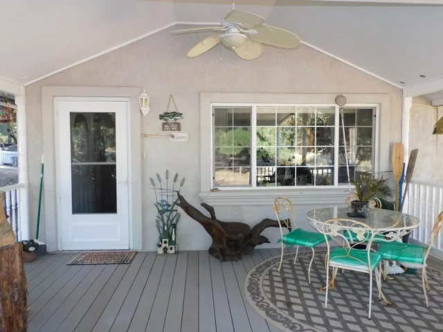 a bathroom with a sink mirror and vanity
