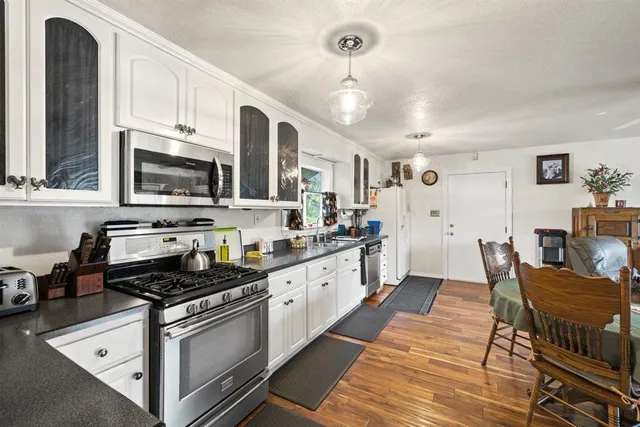 an aerial view of a house with a garden