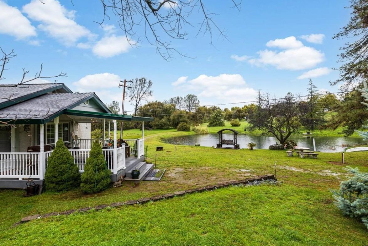 5383 Dream Ranch Circle Placerville, CA 95667 - Photo 45 of 91 a view of a house with a big yard and potted plants