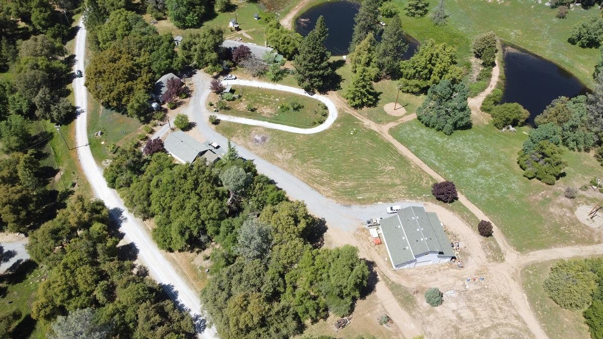 5383 Dream Ranch Circle Placerville, CA 95667 - Photo 72 of 91 an aerial view of a house with a yard and swimming pool