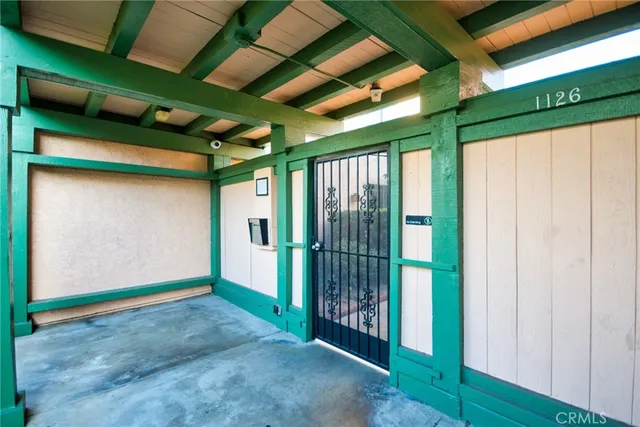 a view of porch with green walls