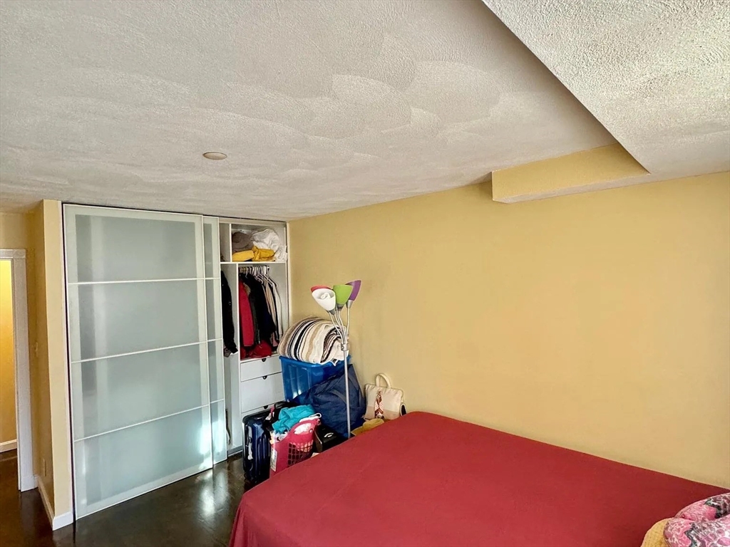 205 Ferry Street, Unit 101 Everett, MA 02149 - Photo 10 of 10 a view of a room with gym equipment