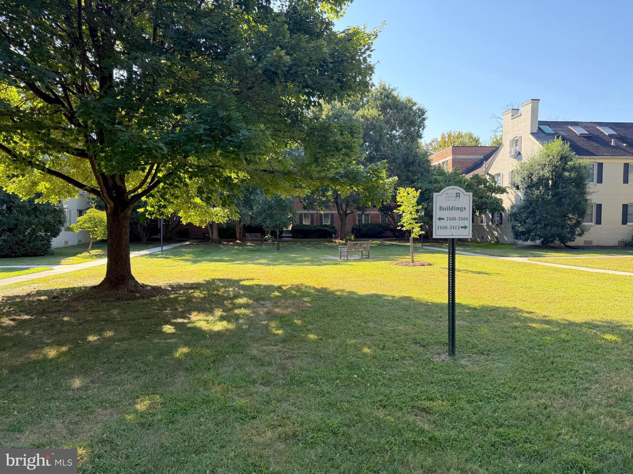 2406 Colston Drive, Unit 302 Silver Spring, MD 20910 - Photo 14 of 21 a view of a swimming pool with an outdoor space and seating area