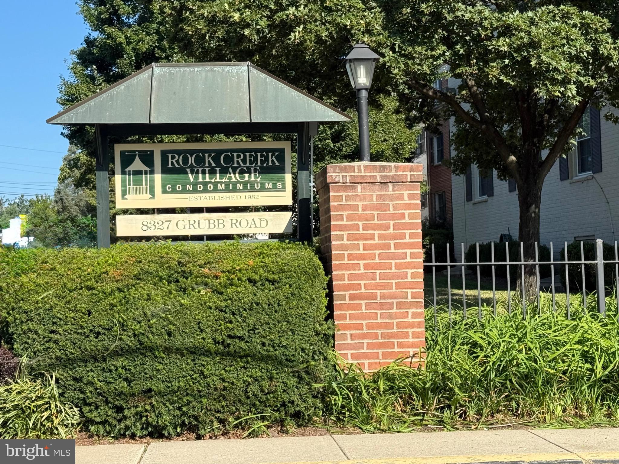 2406 Colston Drive, Unit 302 Silver Spring, MD 20910 - Photo 9 of 21 a back yard of a house with a garden