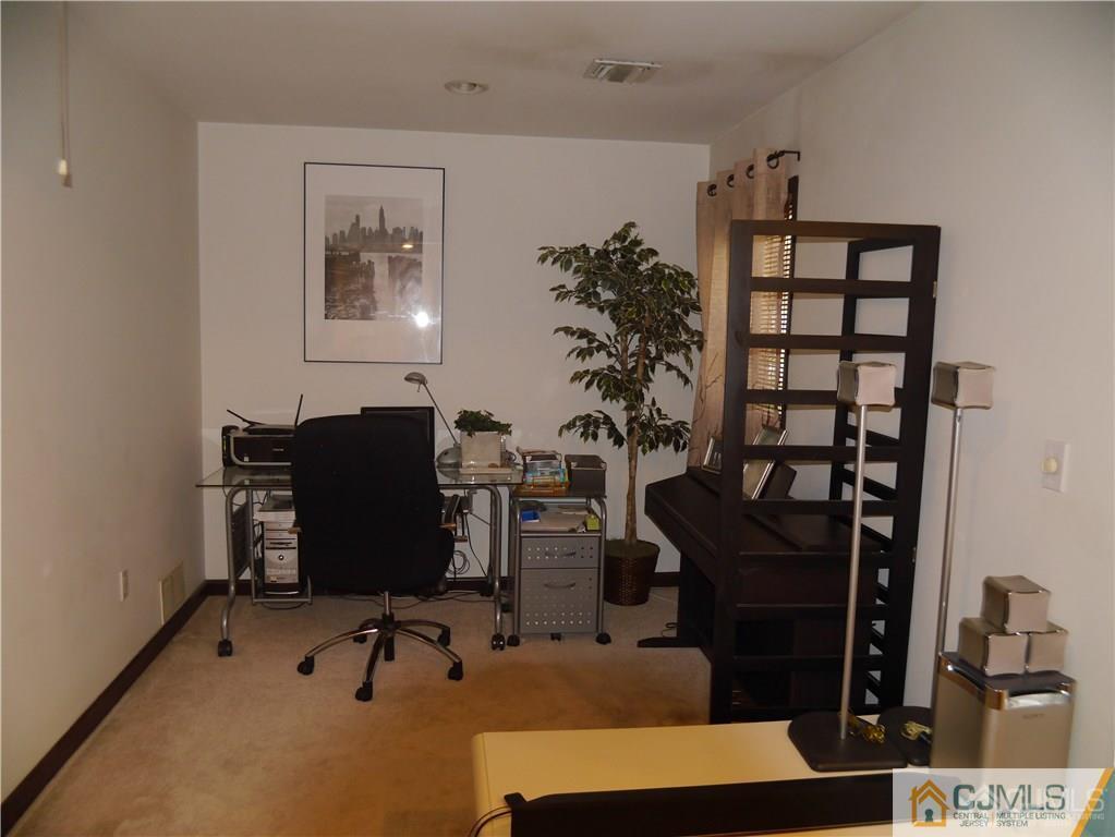 3 Melville Road Edison, NJ 08817 - Photo 6 of 20 a view of a workspace with furniture