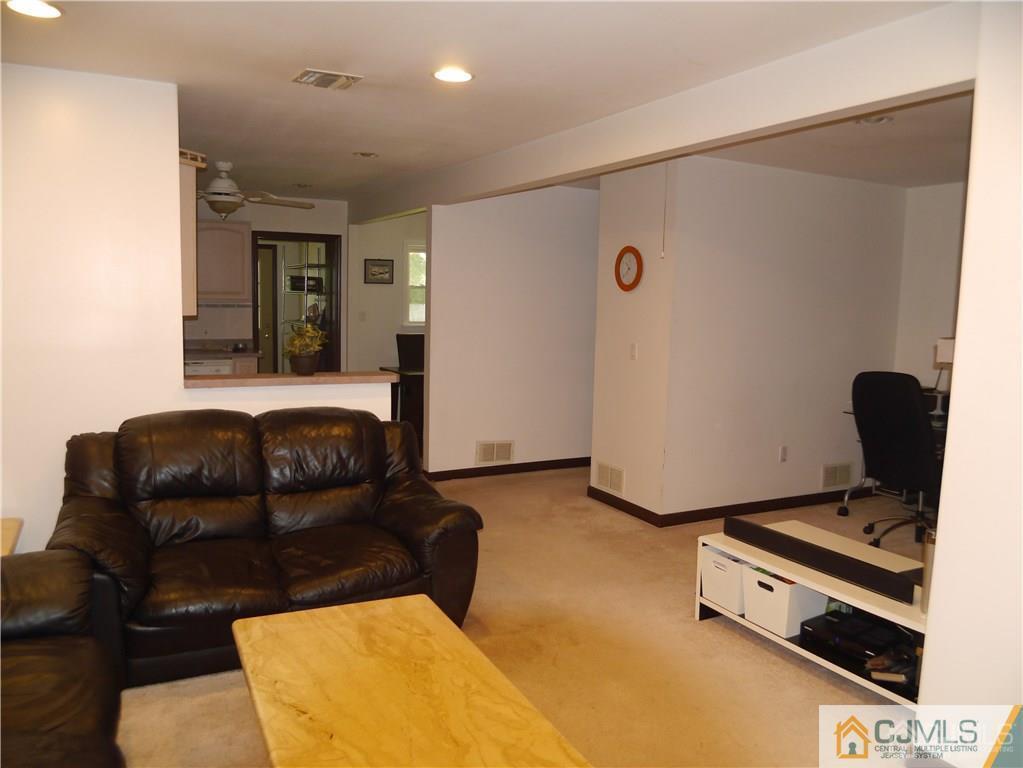 3 Melville Road Edison, NJ 08817 - Photo 7 of 20 a living room with furniture and a window