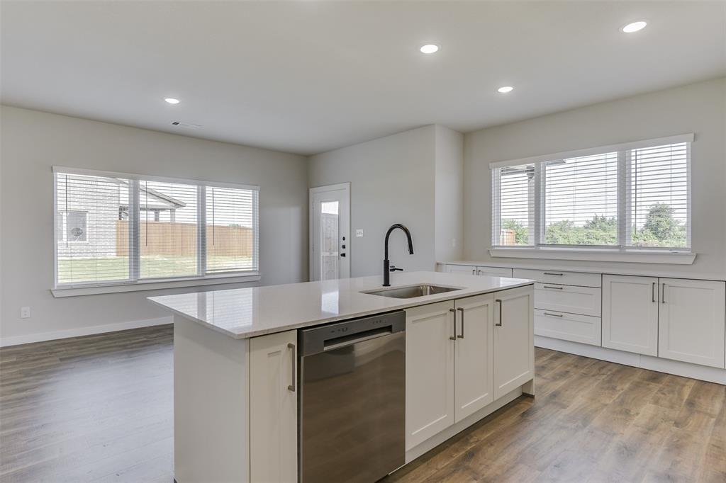 4062 Clovis Street Midlothian, TX 76065 - Photo 12 of 19 a kitchen with sink and window