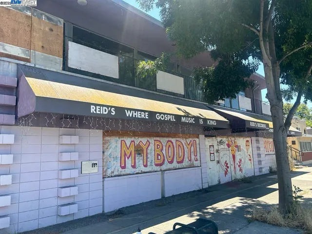 a view of a street with sitting area