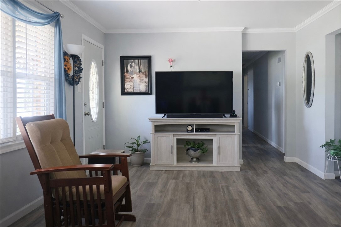 9432 Highway 81 Iva, SC 29655 - Photo 4 of 19 This inviting living space features durable flooring and ample natural light, perfect for everyday living.