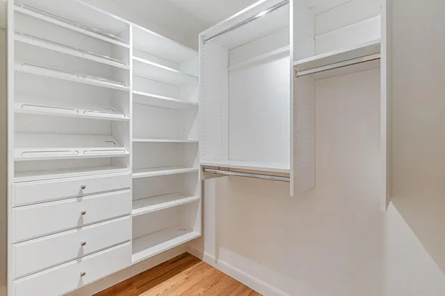 a view of an empty walk in closet