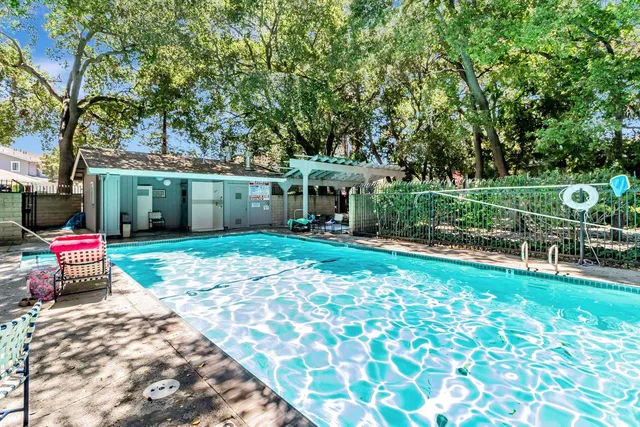 a childrens park with lots of swings and slides