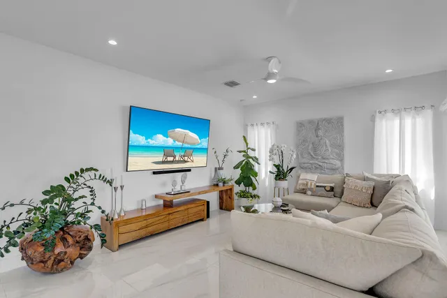 a bedroom with a chair and a couch