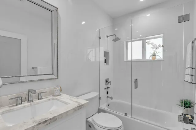 a bed room with furniture and a window