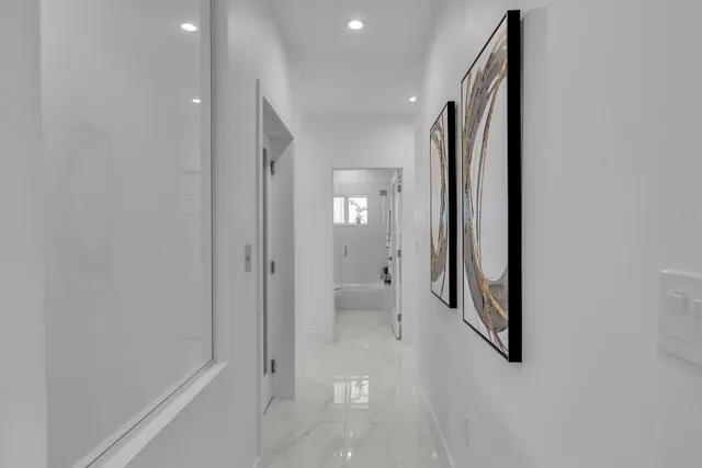 a view of bathroom with washer and dryer