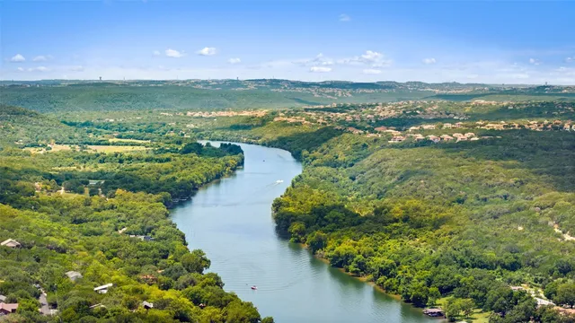 a view of a lake with a city