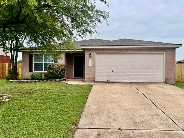 a front view of house with yard