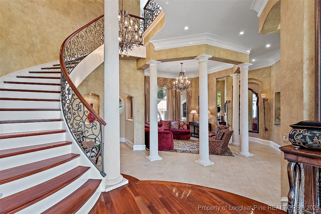 4909 Deep Branch Road Pembroke, NC 28372 - Photo 12 of 50 a view of entryway dining room and hall with wooden floor
