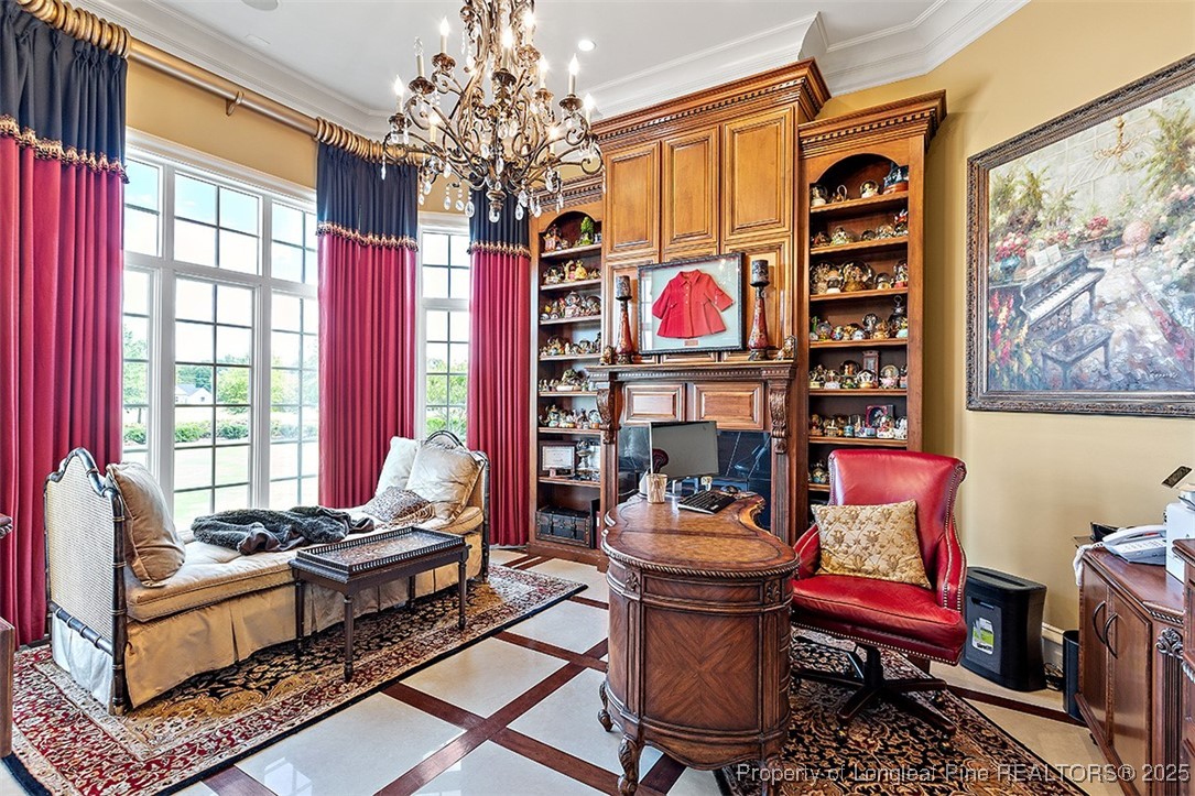4909 Deep Branch Road Pembroke, NC 28372 - Photo 14 of 50 a living room with furniture a chandelier and a window