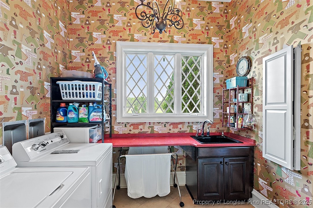 4909 Deep Branch Road Pembroke, NC 28372 - Photo 25 of 50 a utility room with dryer and washer