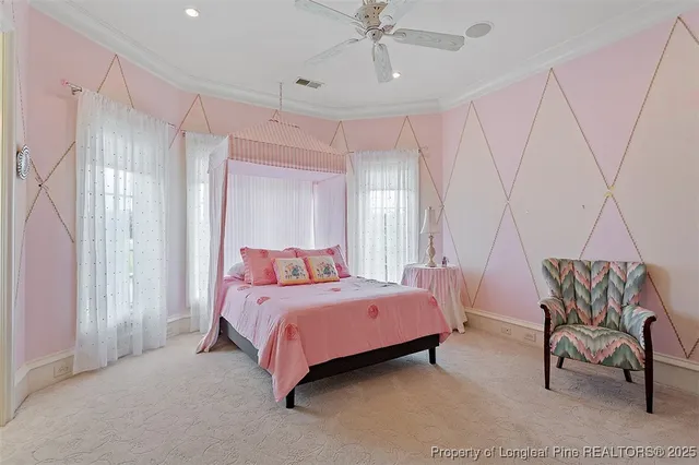 a bedroom with a bed and a chair