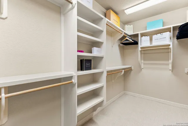 a view of an empty walk in closet