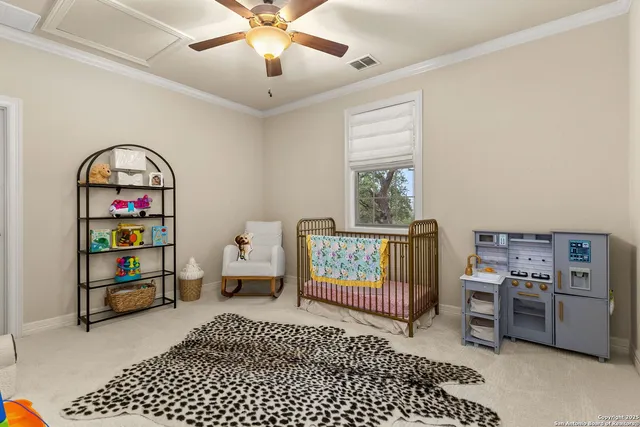 a bedroom with furniture a rug and a window