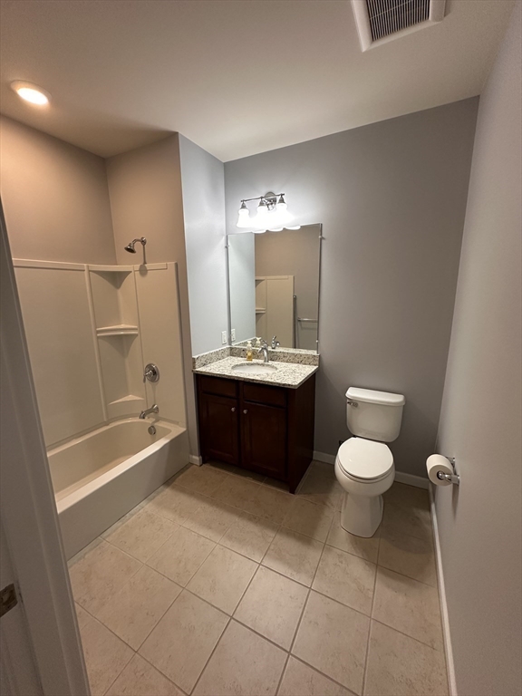 428 John Mahar Highway, Unit 301 Braintree, MA 02184 - Photo 19 of 41 a bathroom with a sink toilet and shower