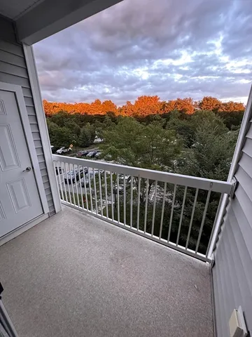 a view of a balcony with city view