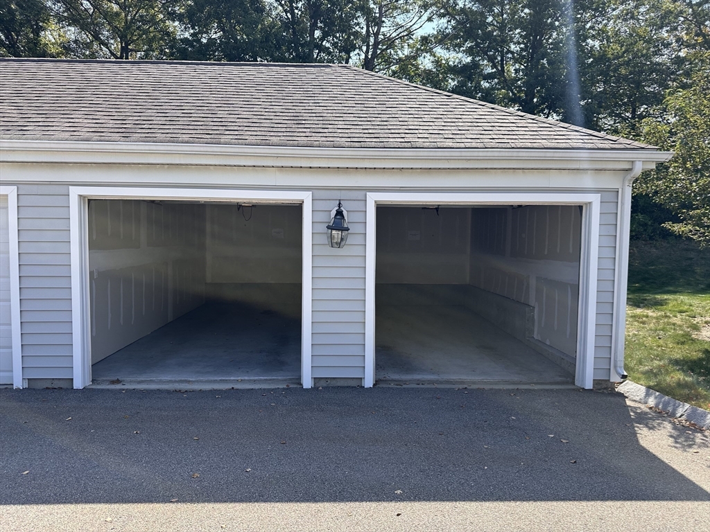 428 John Mahar Highway, Unit 301 Braintree, MA 02184 - Photo 23 of 41 a backyard of a house