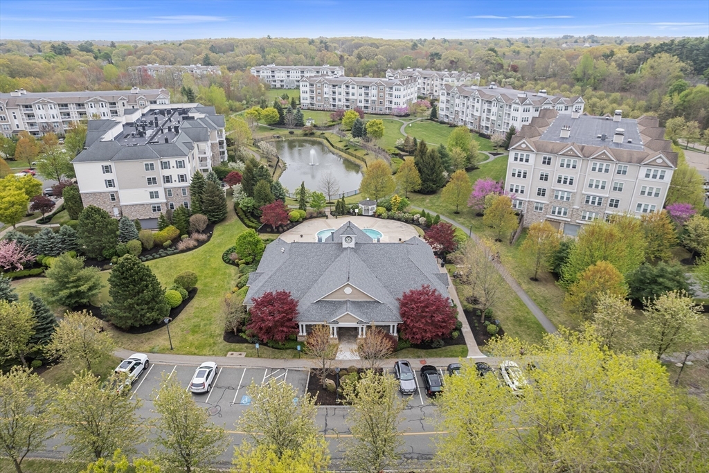 428 John Mahar Highway, Unit 301 Braintree, MA 02184 - Photo 25 of 41 an aerial view of residential houses with outdoor space