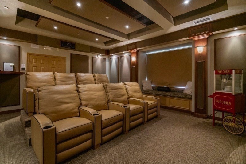 428 John Mahar Highway, Unit 301 Braintree, MA 02184 - Photo 35 of 41 a media room with lots of chairs and a projector