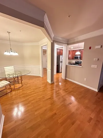 wooden floor in an empty room with window